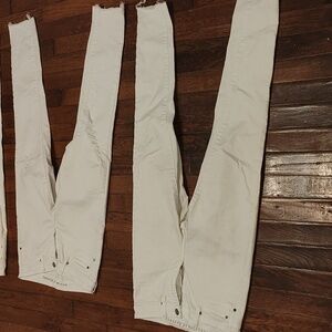 2 pairs women's jeans, size 26 and 27 (4S) white.